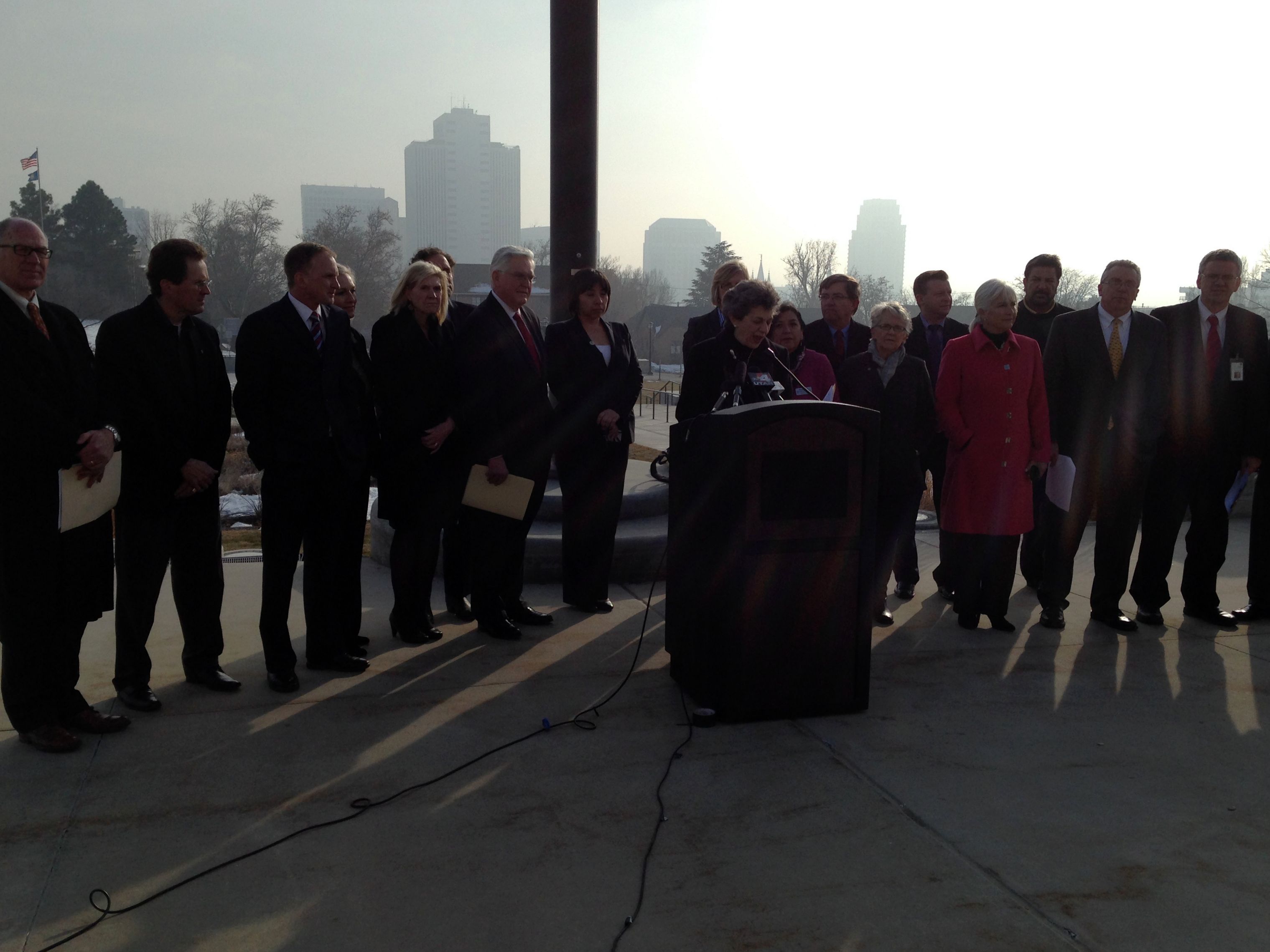 Members of the Utah House Clean Air Caucus gather for a press conference on the steps of the Capitol building in Salt Lake City.