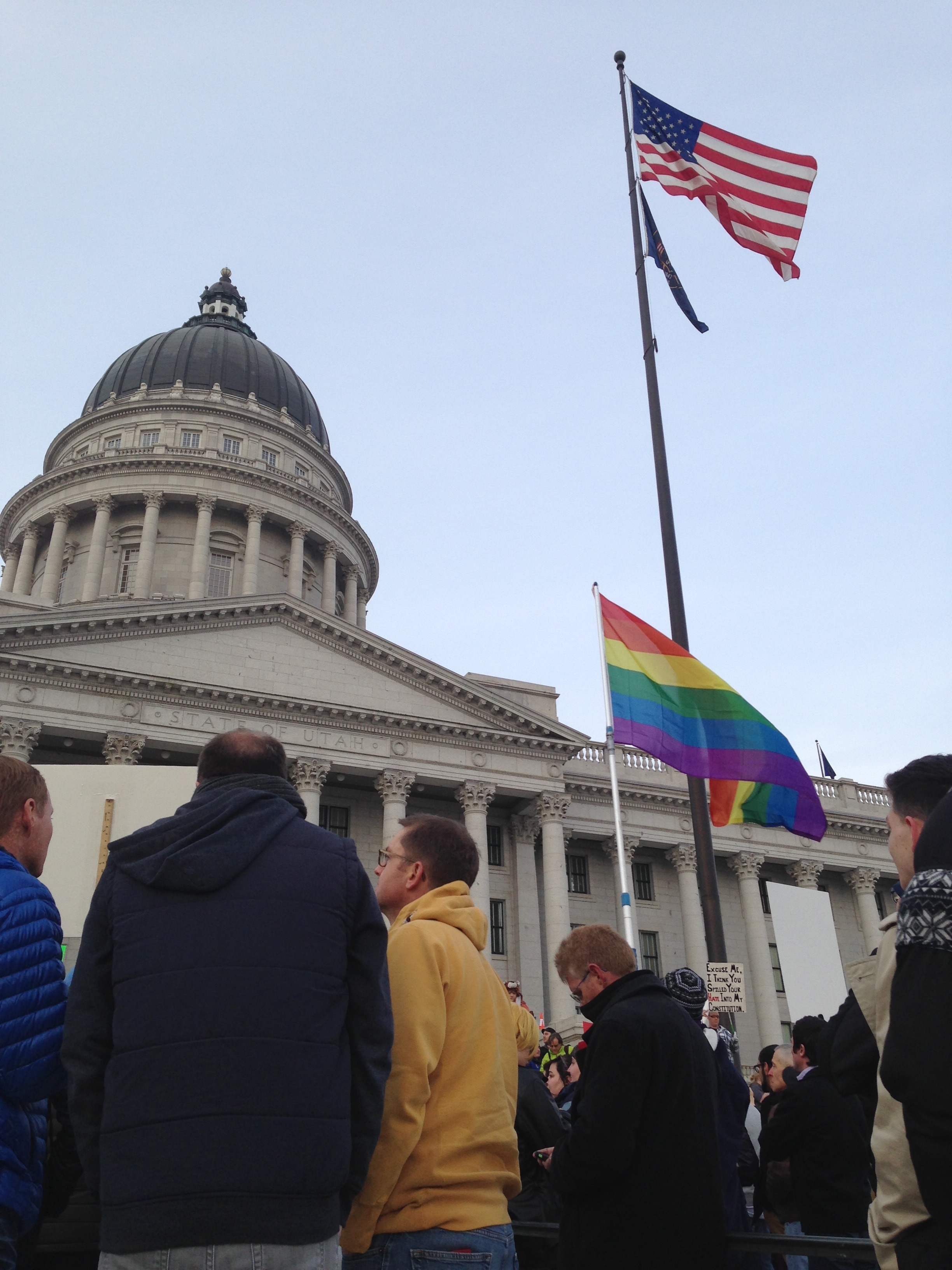 LGBT advocates gather outside the Utah Capitol building.