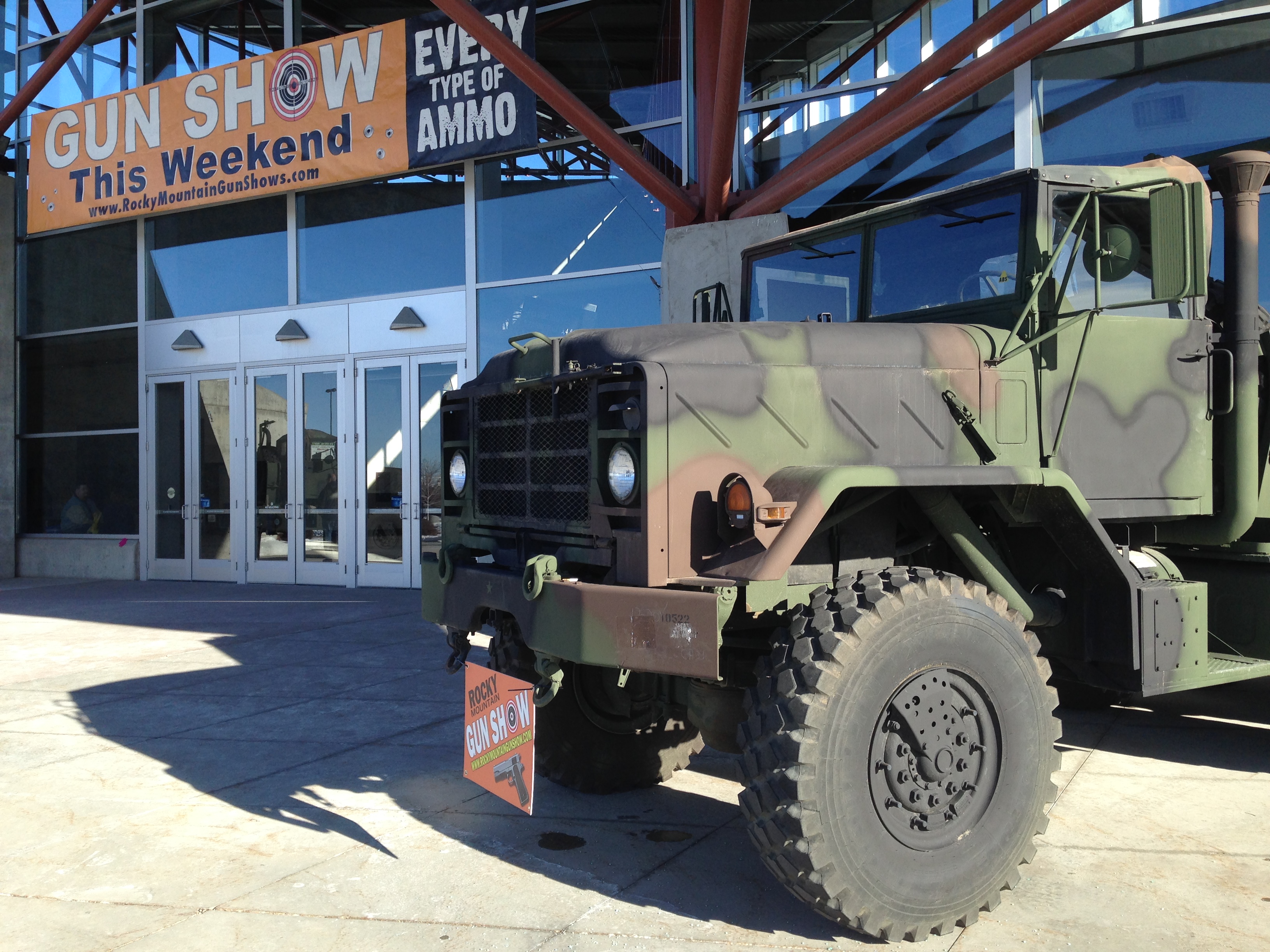 An old military truck adorns the entrance of the Rocky Mountain Gun Show in Sandy.