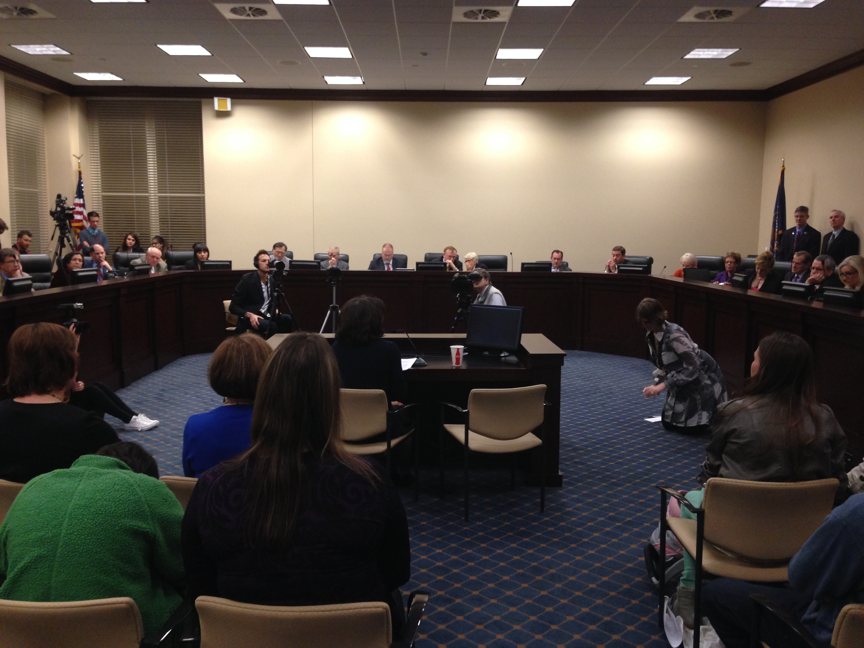 Utah legislators listen to a Utah from the LGBT community share her experiences.