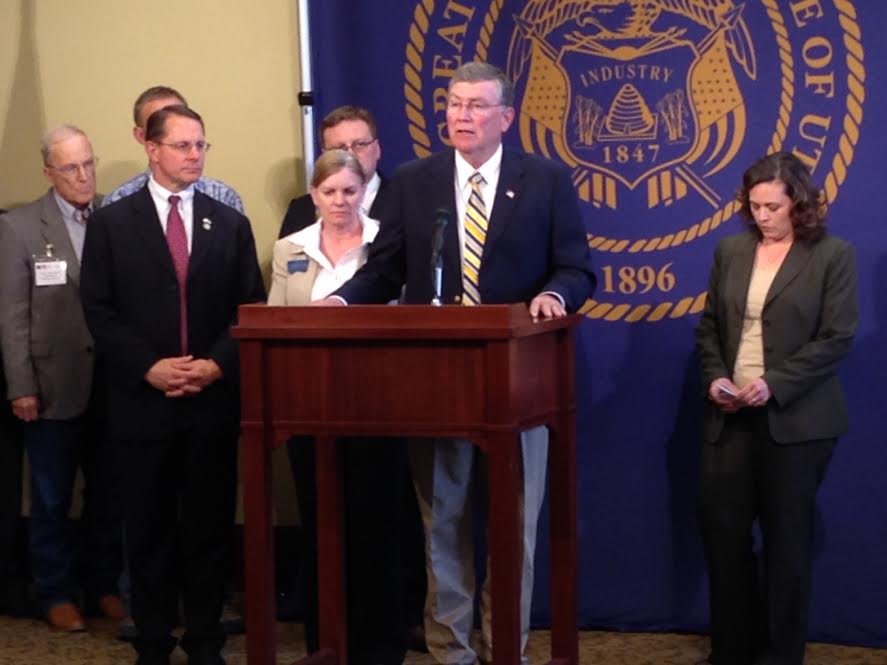 State legislators, including Idaho House Speaker Scott Bedke (speaking) and Utah House Speaker Becky Lockhart (right) speak to the media on the issue of public land management.