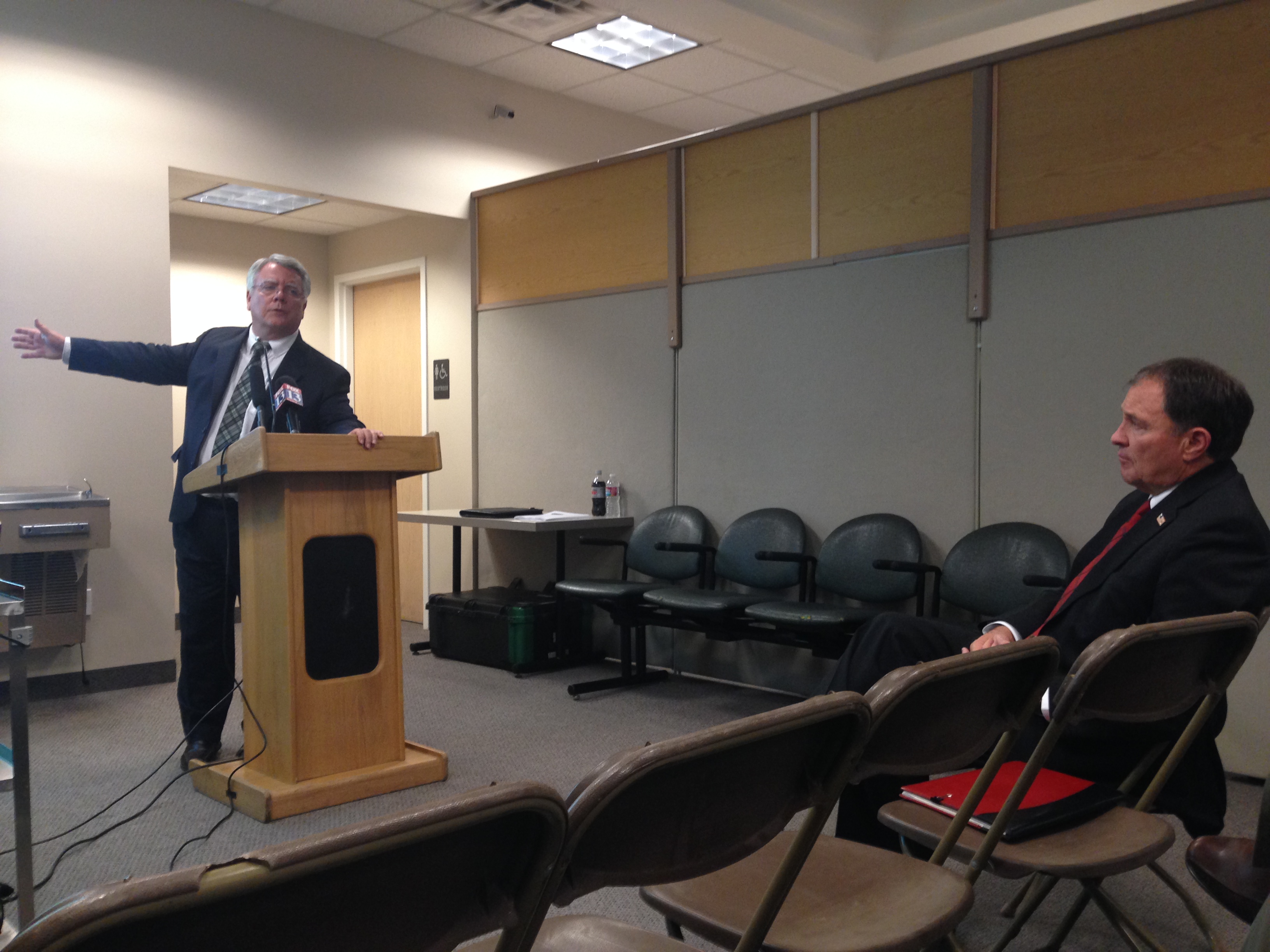 Utah Department of Health Executive Director Dr. W. David Patton gives a presentation on Healthy Utah as Utah Governor Gary Herbert watches on.